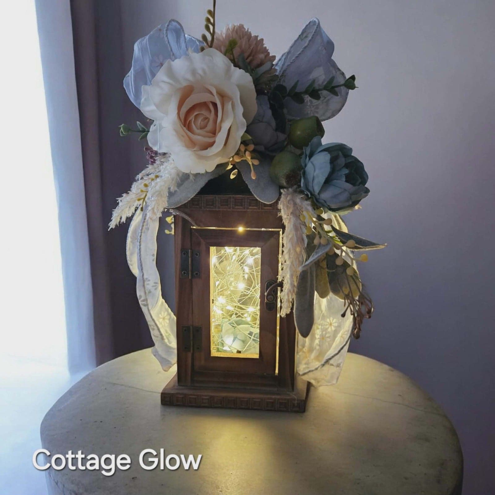 Cottage Glow — handcrafted lantern with fairy lights and cream roses